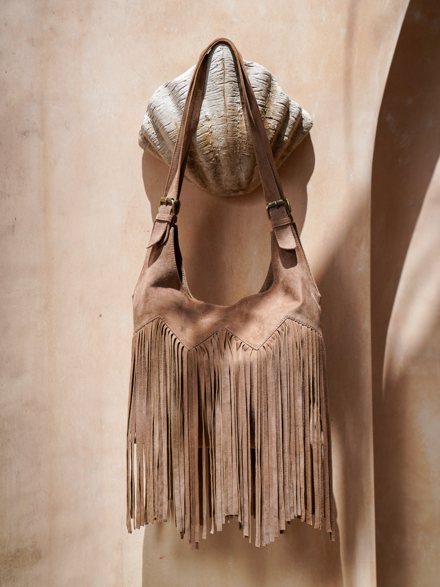 NOMADA FRINGE PURSE TAUPE